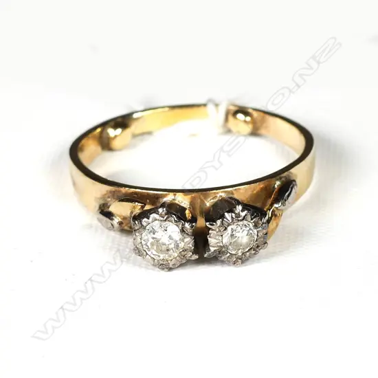 18ct? GOLD AND TWO STONE DIAMOND RING