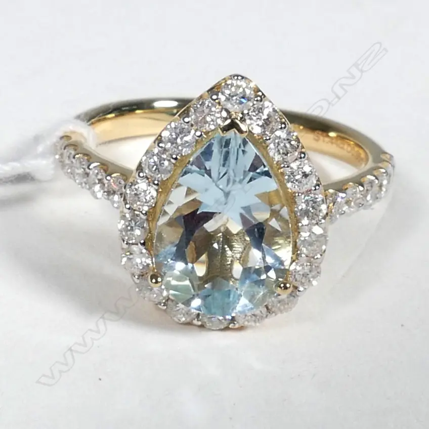 14ct Yellow Gold Aquamarine and Diamond ring featuring centre Image 1++