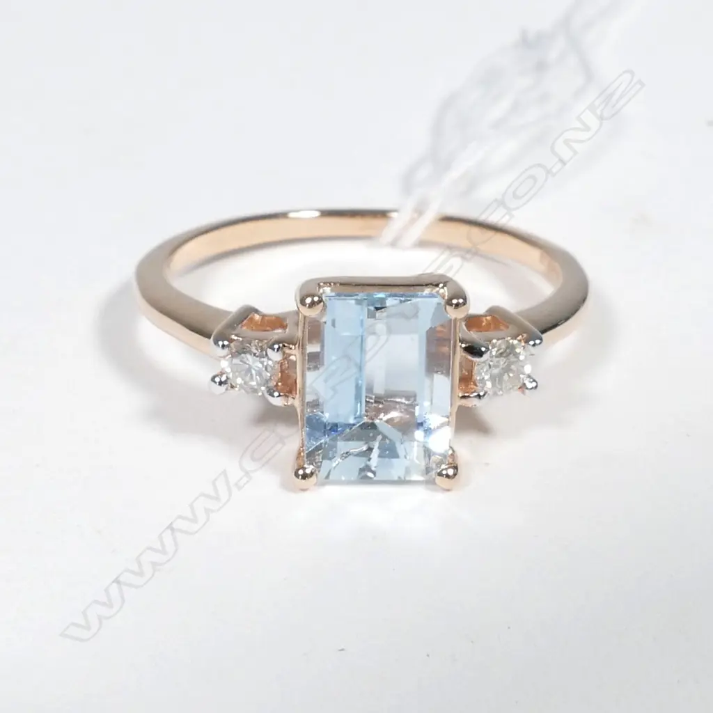 14ct Rose Gold Aquamarine and Diamond ring featuring centre Image 1++