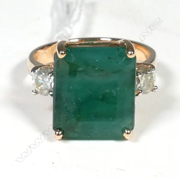 14ct Rose Gold Emerald and Diamond ring featuring centre Image 1++