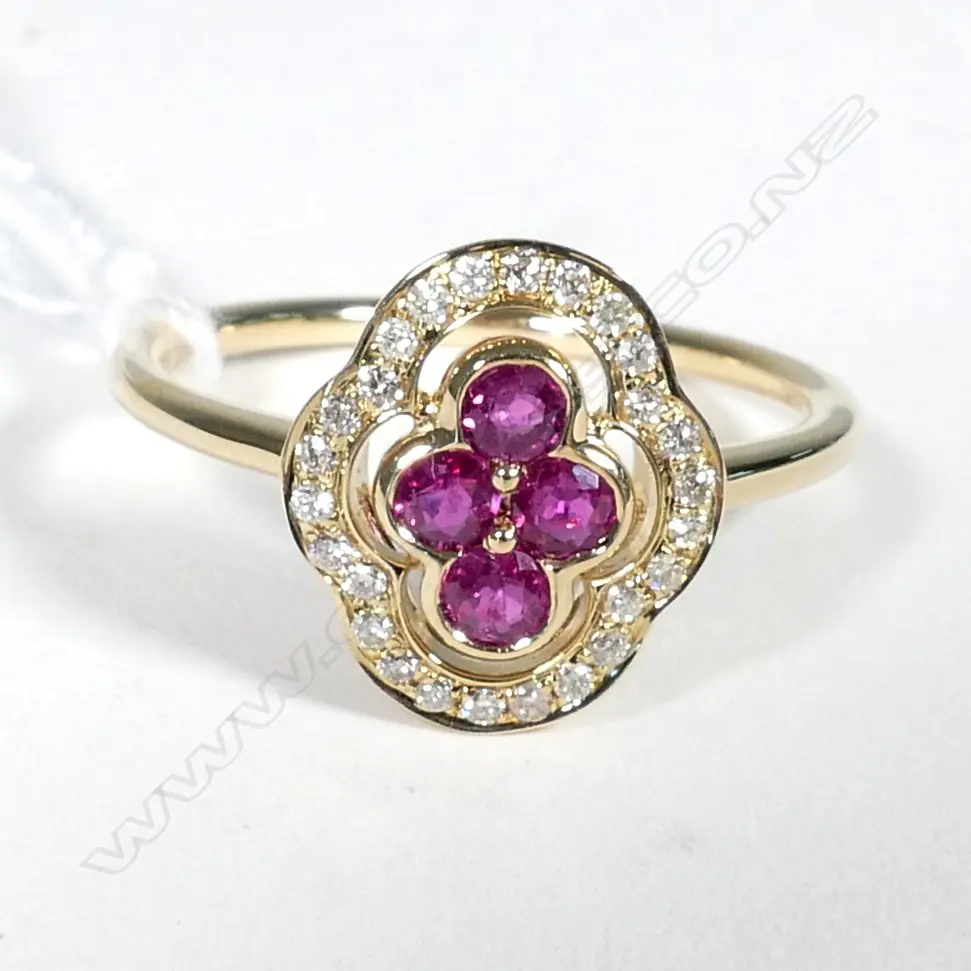 14ct Yellow Gold Ruby and Diamond ring featuring centre Image 1++