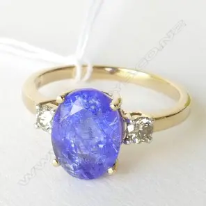 14ct Yellow Gold Tanzanite and Diamond ring featuring centre Image 1++