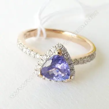 14ct Rose Gold Tanzanite and Diamond ring featuring centre Image 1++