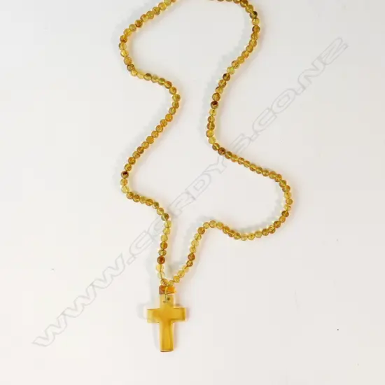 AMBER NECKLACE WITH CRUXIFIX PENDANT