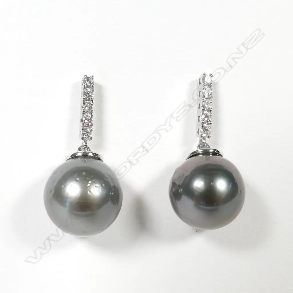 14ct White Gold Pearl and Diamond drop earrings featuring Image 1++