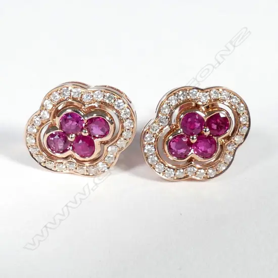 14ct Rose Gold Ruby and Diamond earrings featuring centre