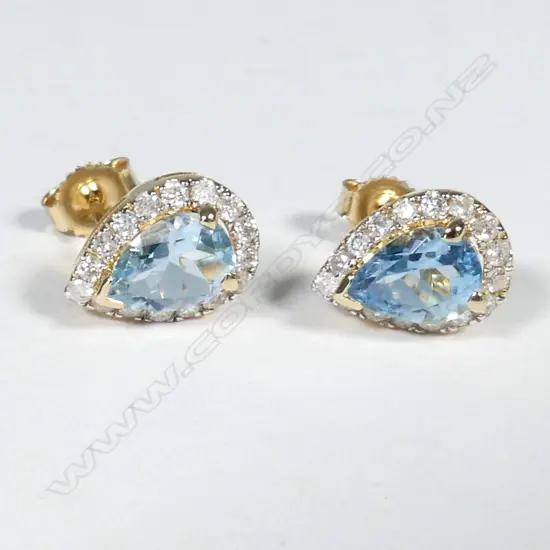 14ct Yellow Gold Aquamarine and Diamond stud earrings featuring centre