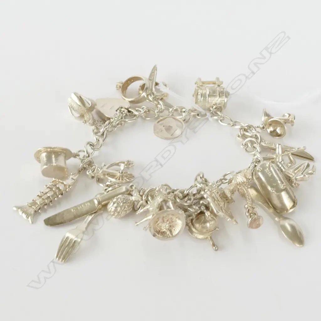 SILVER CHARM BRACELET MAORI PHONE OTHER CHARMS Image 1++