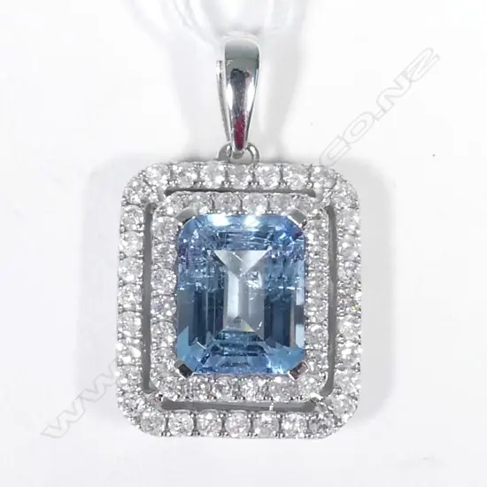 14ct White Gold Aquamarine and Diamond pendant featuring centre