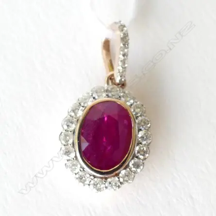 14ct Rose Gold Ruby and Diamond pendant featuring centre Image 1++