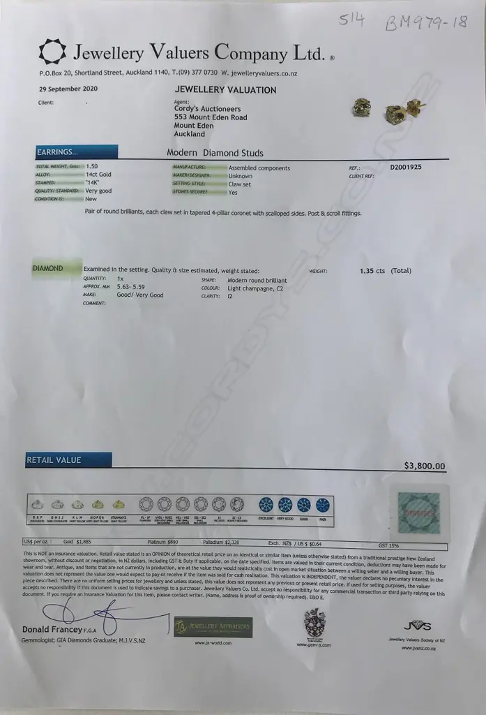 A pair of 14ct gold and diamond stud earrings Image 1++