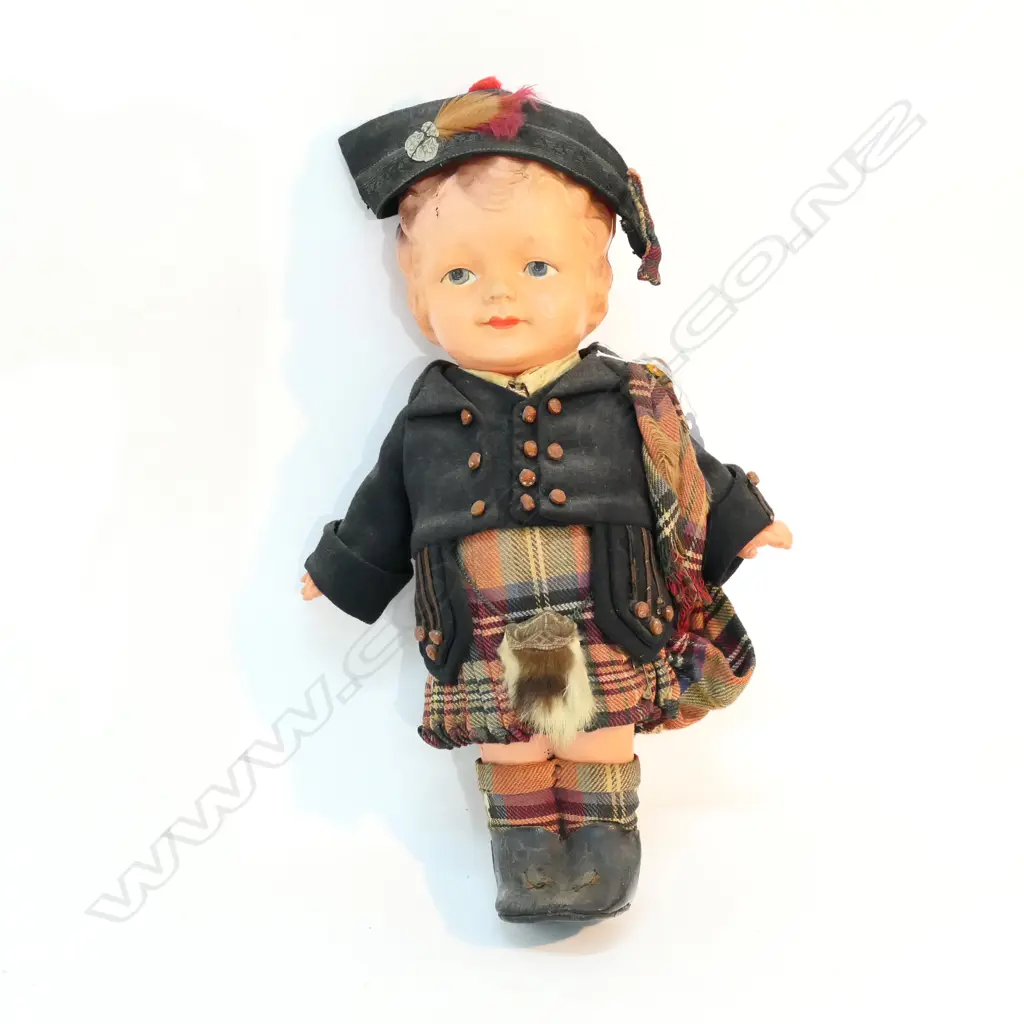 A CELLULOID DOLL IN SCOTTISH COSTUME H 290 MM A/F Image 1++
