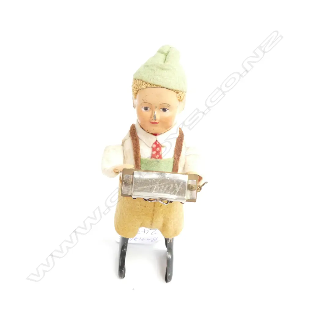 A SCHUCO C/WORK HARMONICA PLAYING BOY H 130 MM Image 1++