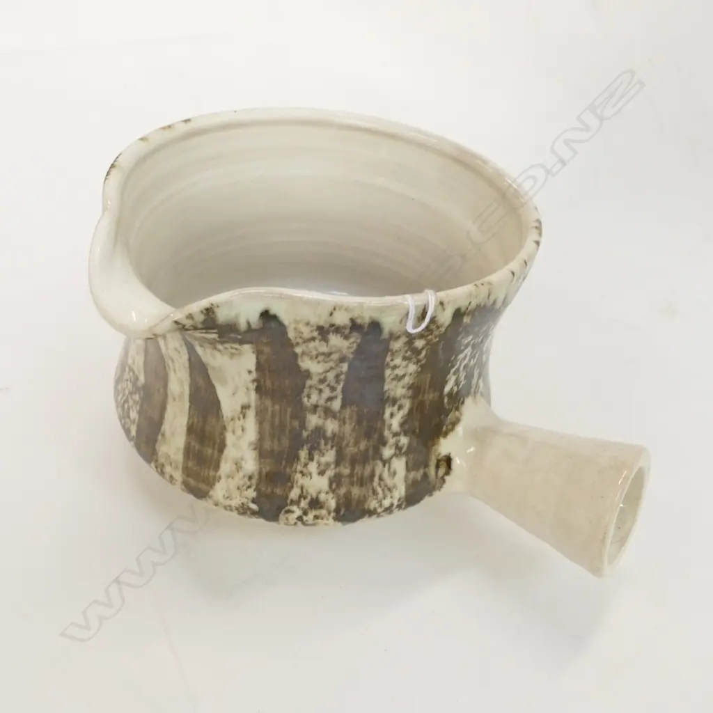 Hanmer Pottery bowl with long handle triangle mark Image 1++