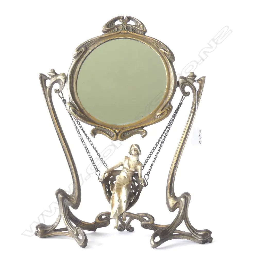 Art Nouveau 'Erte' silver plate dressing table mirror with young female in swing suspended from whiplash frame. Replacement chain. Stamped 'ERTE PARIS 1907' Image 1++