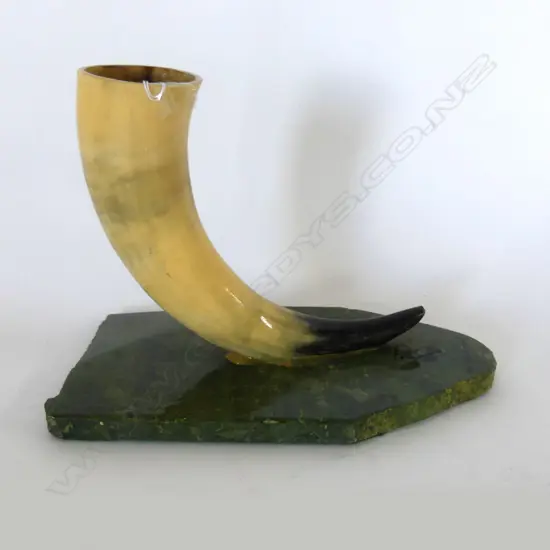 LARGE LACQUERED HORN ON GREENSTONE BASE WITH 'NZ MADE' STAMP, H. 135MM