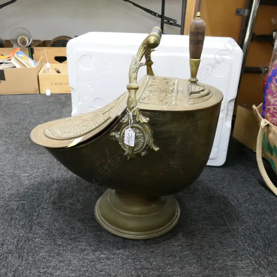 A 19THC BRASS COAL HELMET