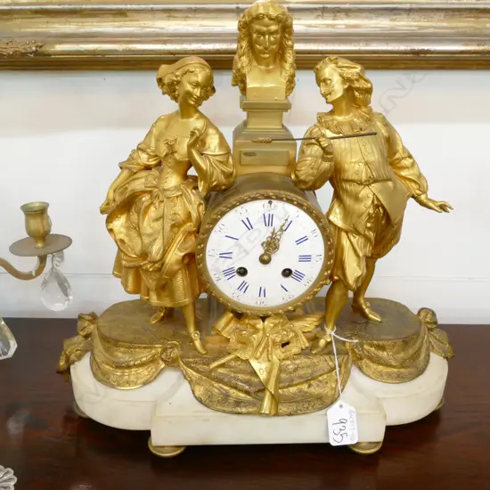 A 19THC ALABASTER BASED AND GILDED FIGUREL MANTLE CLOCK 