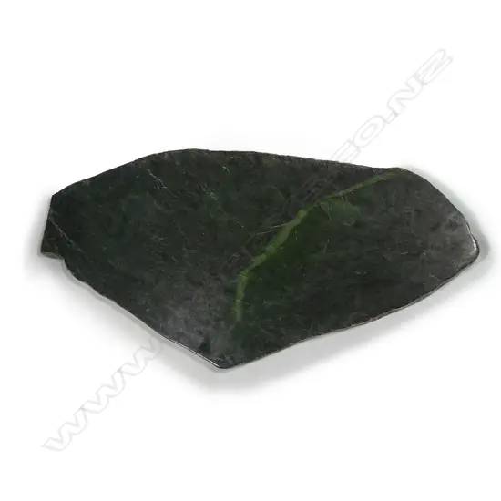 A large cut slab of serpentinite (pounamu)