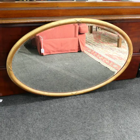 OVAL GILT FRAMED MIRROR