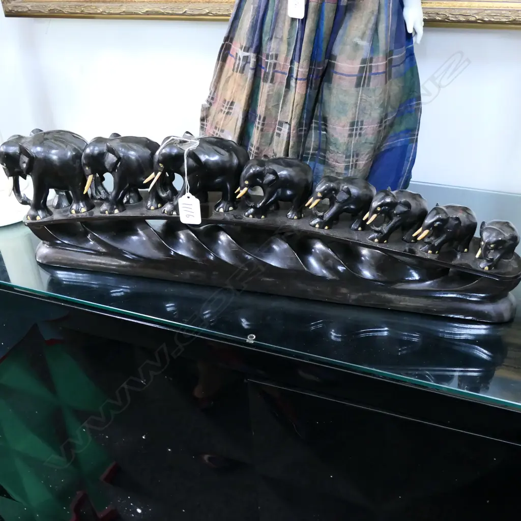 8 EBONY ELEPHANTS ON STAND L 600 MM Image 1++