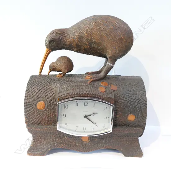A carved N.Z. folk art clock