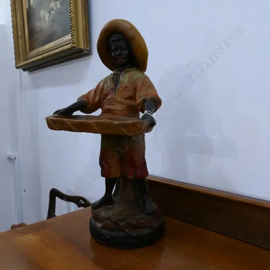 A STANDING PLASTER BOY WITH TRAY H 540 MM