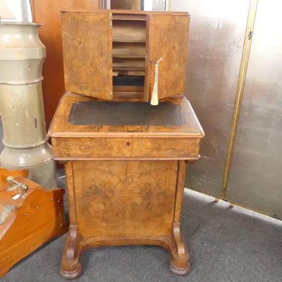 A 19THC WALNUT INLAID DAVENPORT WITH WELL FITTED UPPER SECTION