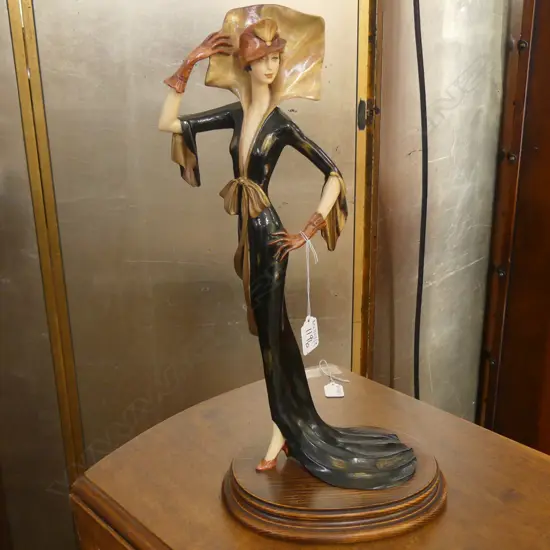 A SANTINI SIGNED RESIN FIGURINE