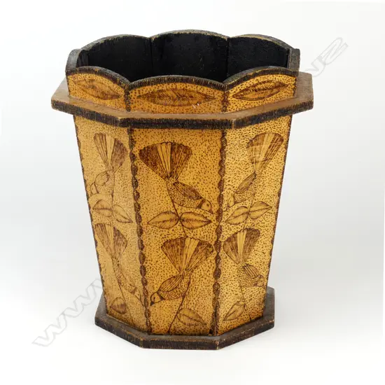 A New Zealand pokerwork wastepaper bin