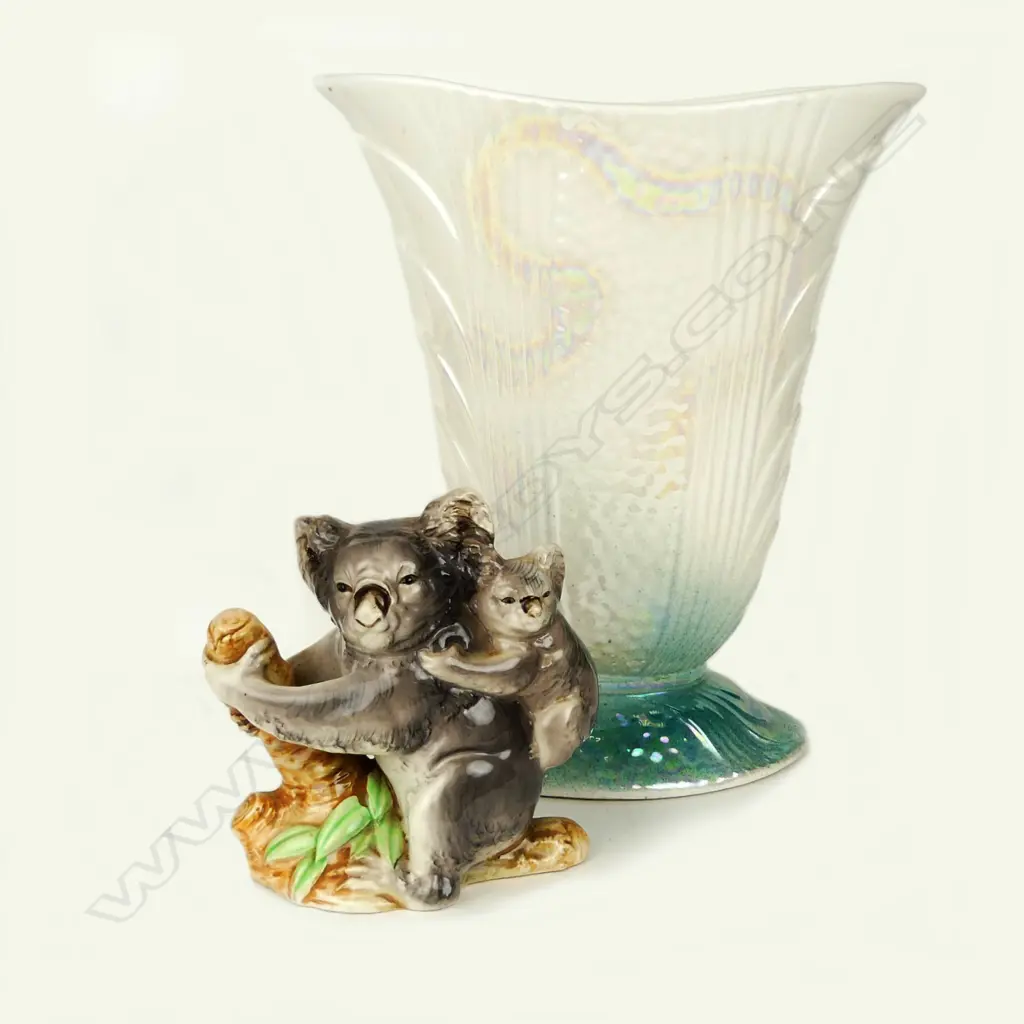 A Titian Studios lustre vase together with a koala group figure Image 1++