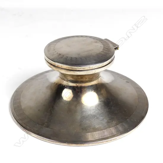 A silver inkwell