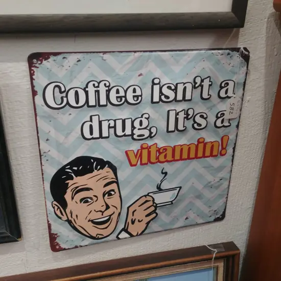 TIN SIGN "COFFEE ISN'T A DRUG, IT'S A VITAMIN"
