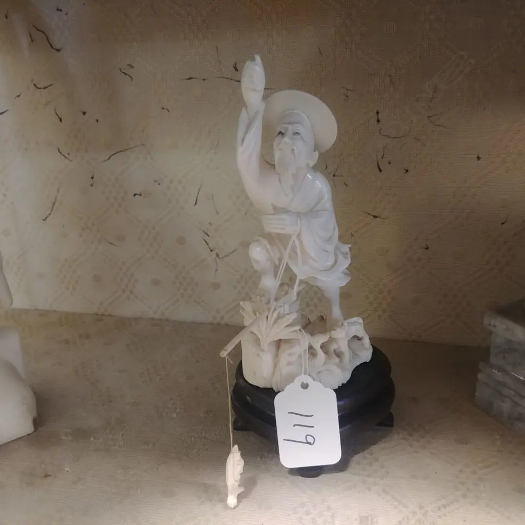 IVORY FISHERMAN Image 1++