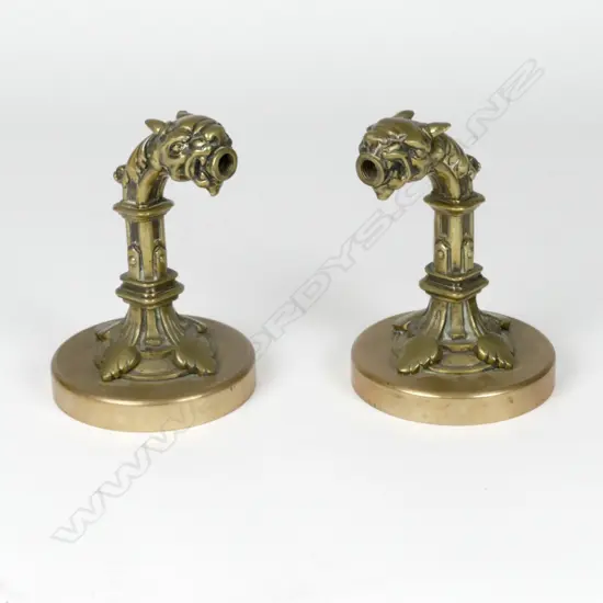 A pair of bronze and brass 19thC lamp fittings