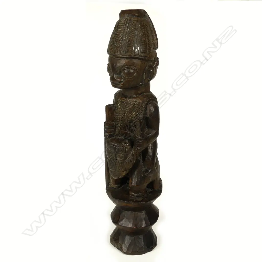 A West African carved wooden figure on horseback Image 1++