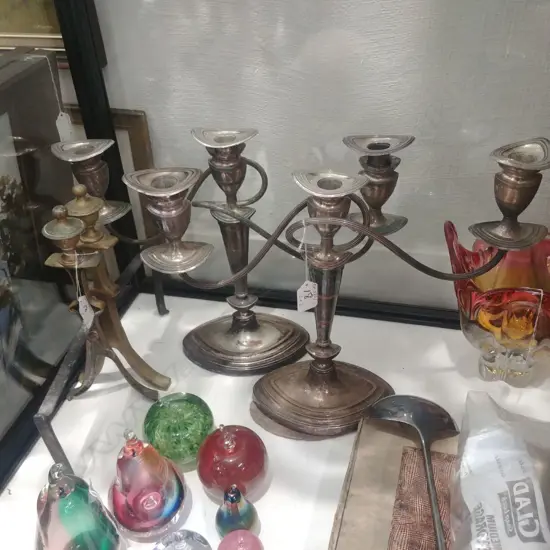 2 SIL PLATE CANDELABRAS; 2 BRASS FIRE DOGS