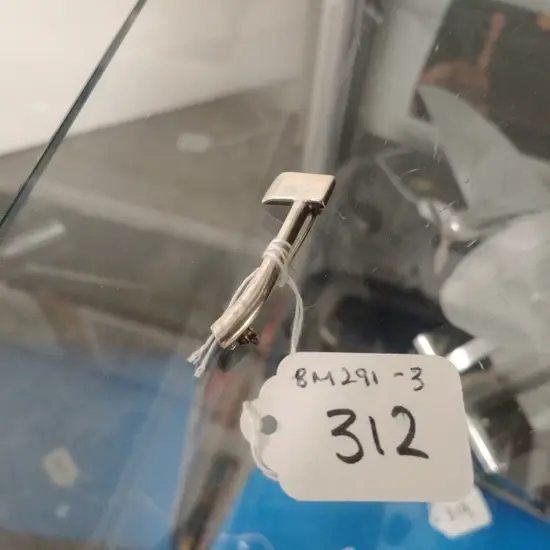 STG SILVER AXE BROOCH
