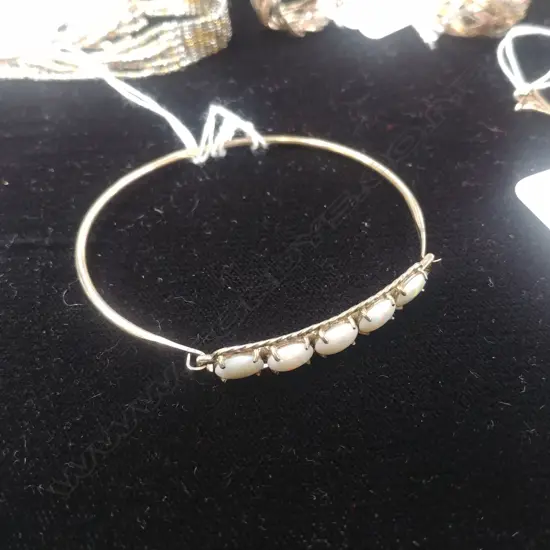 SILVER GILT AND OPAL BANGLE