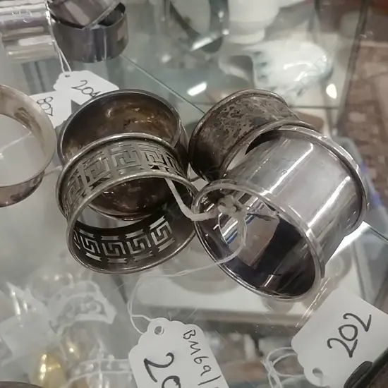 4 S/S NAPKIN RINGS