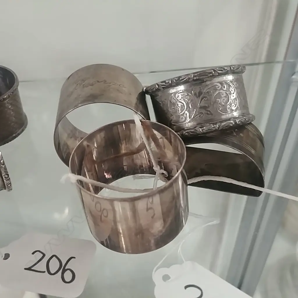 4 S/S NAPKIN RINGS Image 1++