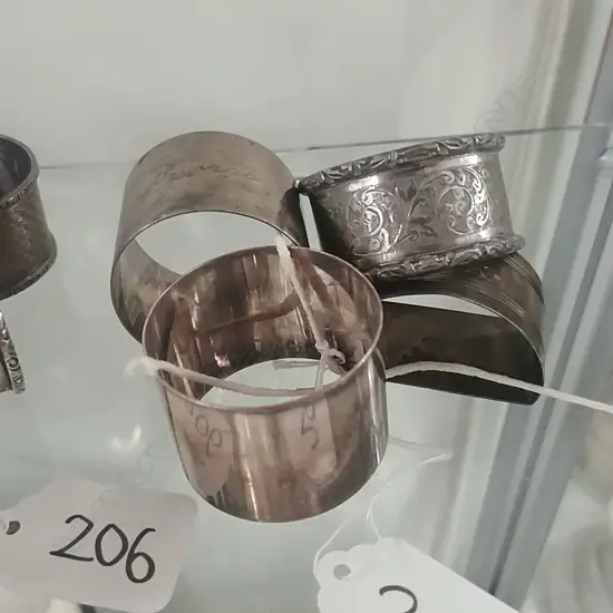 4 S/S NAPKIN RINGS