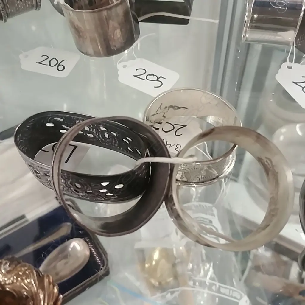 4 S/S NAPKIN RINGS Image 1++