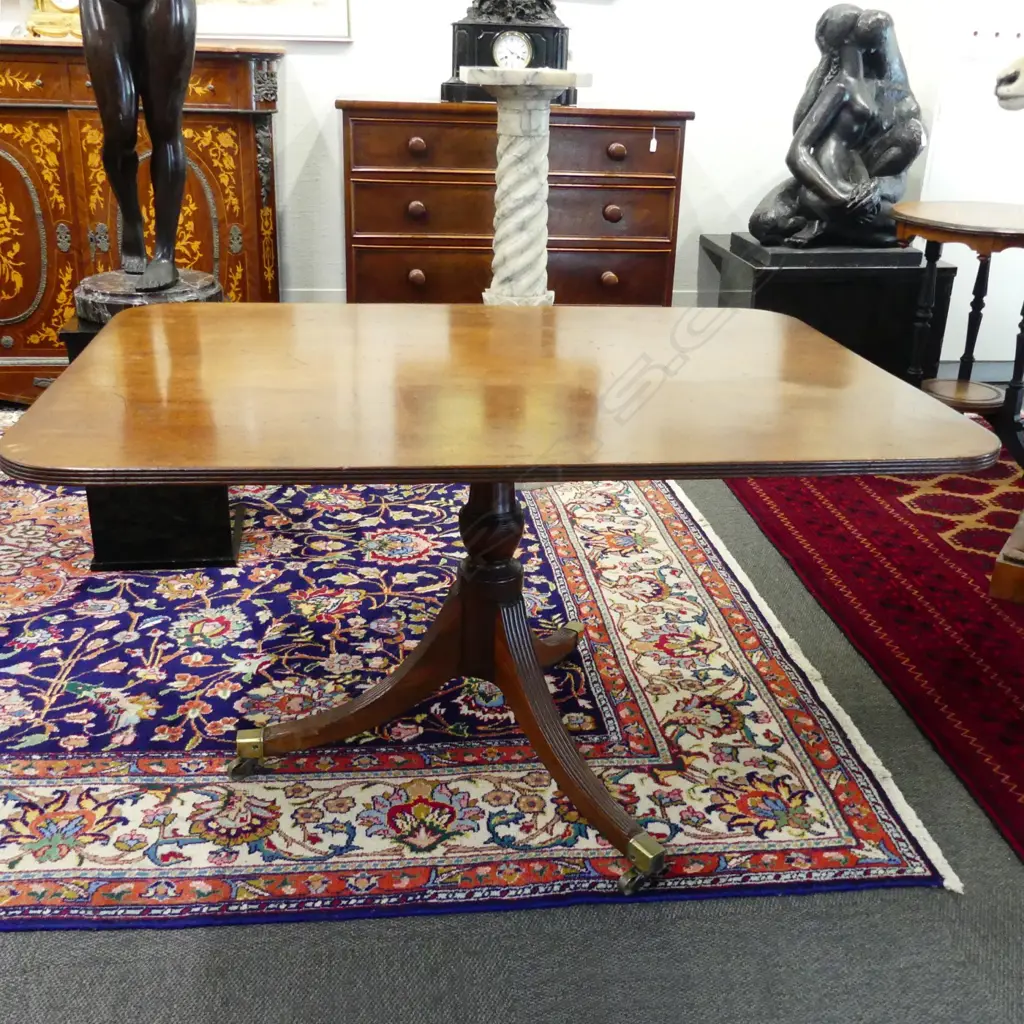 A Regency mahogany oblong tilt-top breakfast table Image 1++