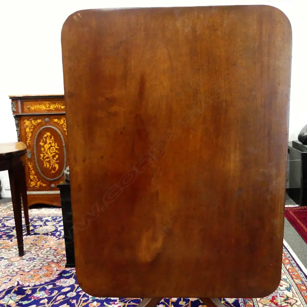A Regency mahogany oblong tilt-top breakfast table Image 1++