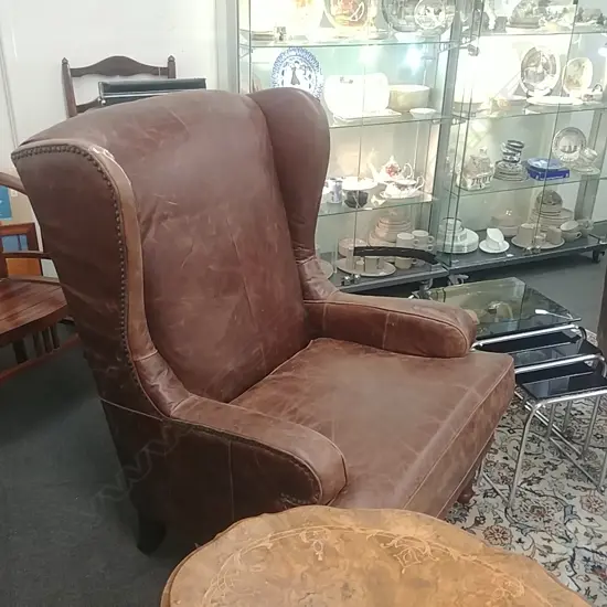PAIR OF LEATHER WING BACK CHAIRS