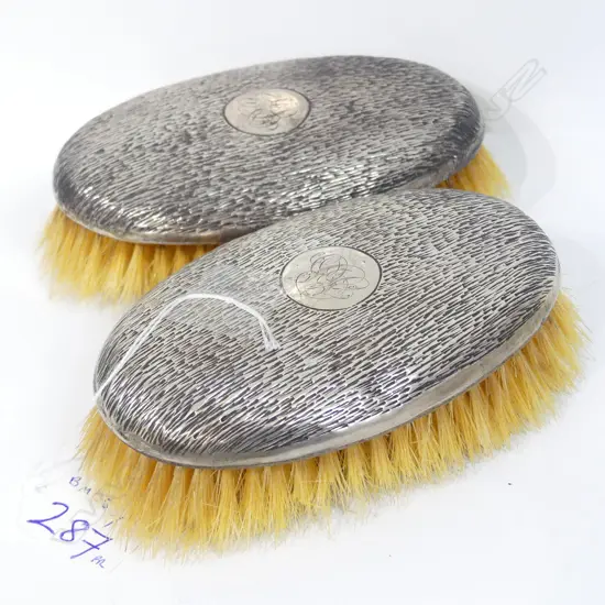 PAIR SILVER BACKED BRISTLE CLOTHES BRUSHES