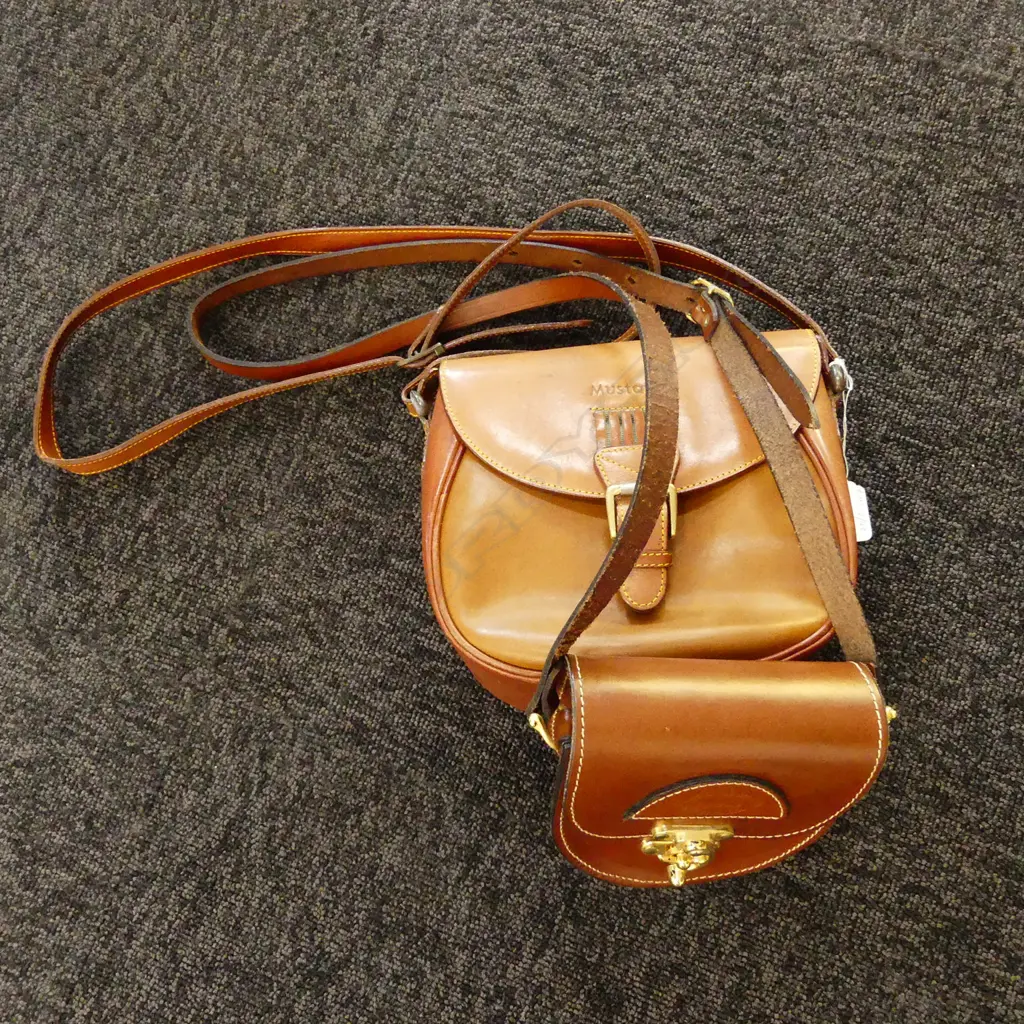 2 LEATHER SATCHELS INC CONTENTS   Image 1++