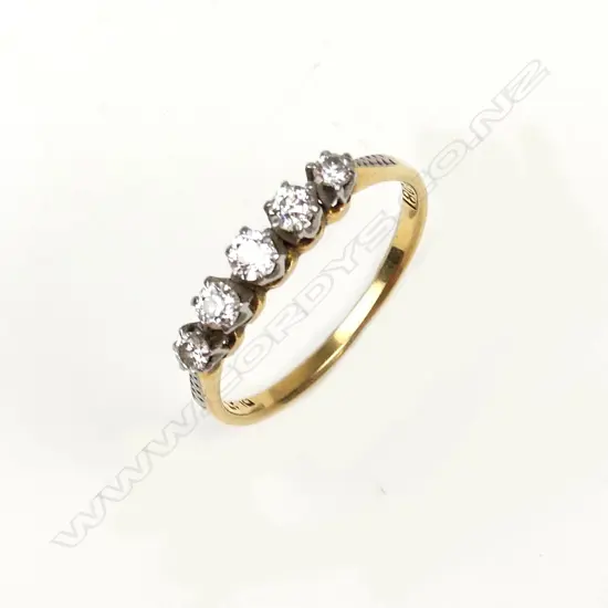 A vintage 18ct. yellow gold and five stone diamond ring