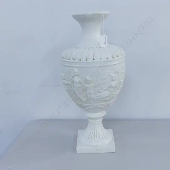 AN ITALIAN RELIEF MOULDED CLASSICAL VASE H.450